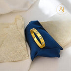 Ornate Emblem Bangle